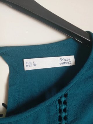 Blusa verde azulado con detalles