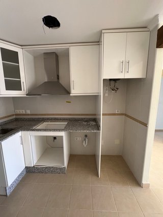 Cocina nueva con invernadero y fregadero