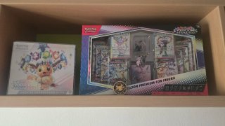 Pokemon TCG: Caja Entrenador Élite Evoluciones Pri
