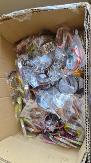 Lote 100 pulseras acero y cuero