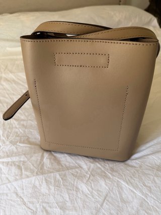 Bolso bucket Ralph Lauren beige y dorado