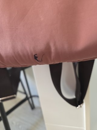 Mochila parfois rosa apagado.