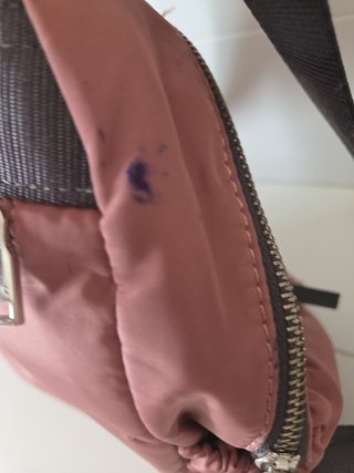 Mochila parfois rosa apagado.