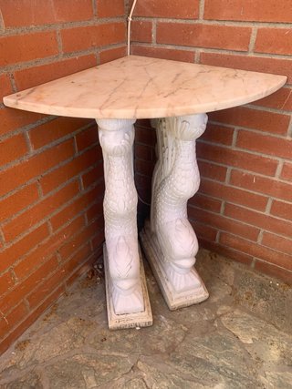 Bases de mesa con pies de pez.