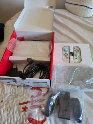 Nintendo Switch OLED + Mario Kart 8 Deluxe
