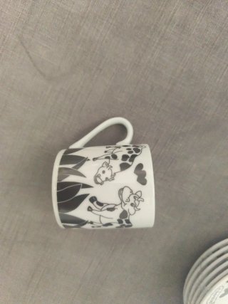Set caffè con design di vitelli bianco e nero