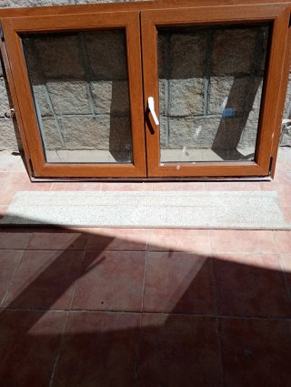 Ventana PVC marrón doble cristal