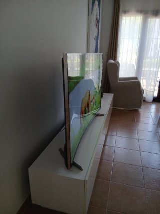 Televisor 55" Curvo UHD 4K Smart TV HU7100
