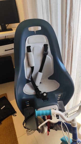 Sillita bebé para bicicleta con funda y casco