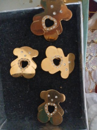 Conjunto de ositos dorados con brillantes