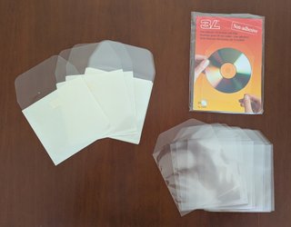 90 Etiquetas CD/DVD ADHESIVAS + FUNDAS ADHESIVAS
