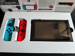 Nintendo Switch + Zelda Breath + Mario Odyssey