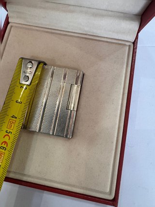 Encendedor de lujo S.T. Dupont chapado en plata con estuche original