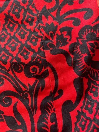 Traje de flamenca rojo y negro