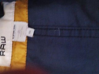 Impermeable negro con capucha