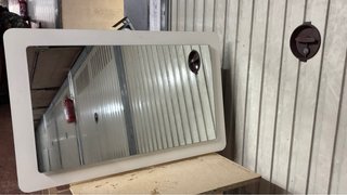 Mueble de baño suspendido con espejo