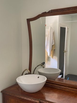 Mueble buffet vintage convertido en lavabo
