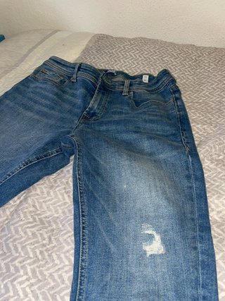 Vaqueros azules desgastados