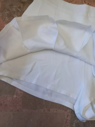 Falda pantalón blanca plisada