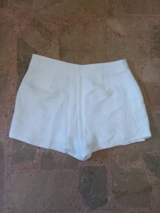 Falda pantalón blanca plisada