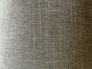 Sofá gris IKEA con puff