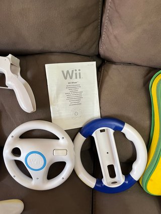 Pacchetto Nintendo Wii: Giochi e Accessori