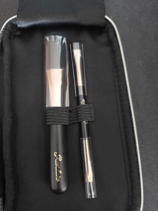 Neceser con brochas Guerlain negro