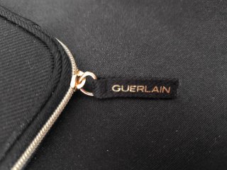 Neceser con brochas Guerlain negro