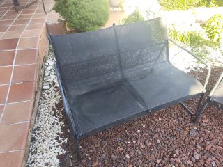 Silla de terraza negra y marrón