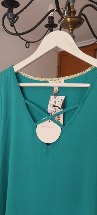 Vestido verde cruzado marca la talla S da más tall
