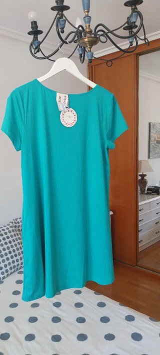 Vestido verde cruzado marca la talla S da más tall
