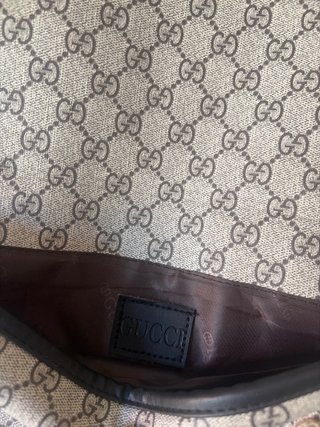 Bolsito Gucci Monogram Marrón