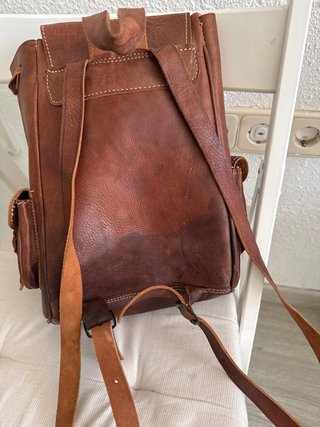 Riñonera y mochila de cuero