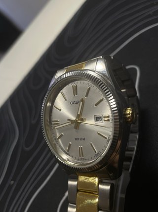 Reloj Casio MTP-1302 Dorado y Plateado