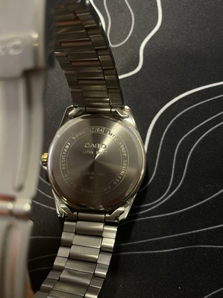 Reloj Casio MTP-1302 Dorado y Plateado