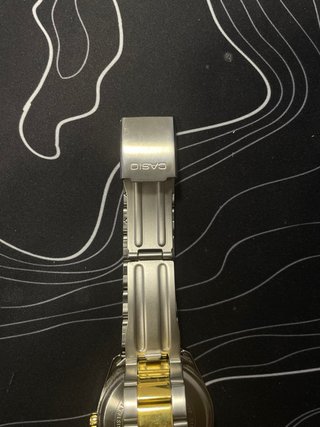 Reloj Casio MTP-1302 Dorado y Plateado