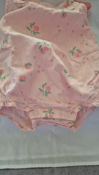 Body de bebé con tirantes y estampado floral