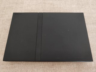 Lotto PS2 Slim PlayStation + 8 Videogiochi