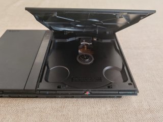 Lotto PS2 Slim PlayStation + 8 Videogiochi