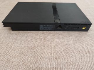 Lotto PS2 Slim PlayStation + 8 Videogiochi