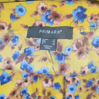 Mono corto flores con lazo Primark 34