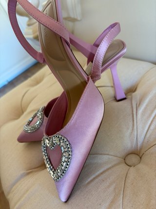 Zapatos rosas Primark con corazón joya