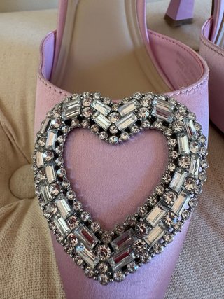 Zapatos rosas Primark con corazón joya