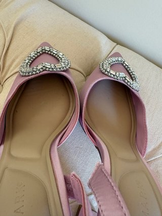 Zapatos rosas Primark con corazón joya