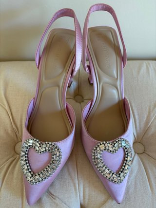 Zapatos rosas Primark con corazón joya
