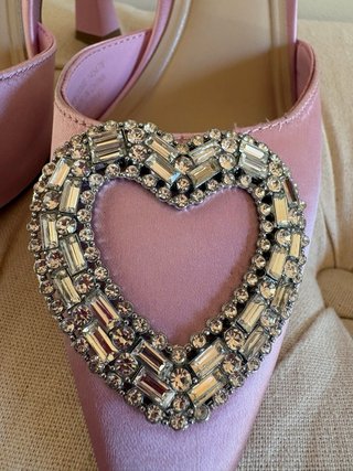 Zapatos rosas Primark con corazón joya