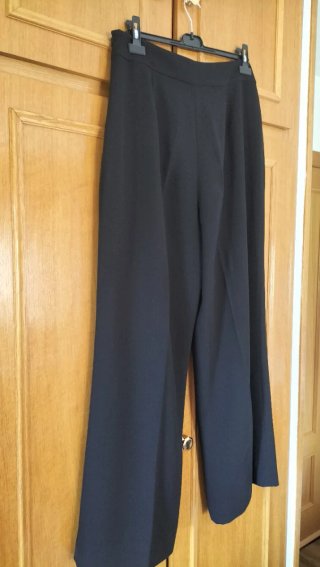 Elegante pantalón pata ancha cintura alta