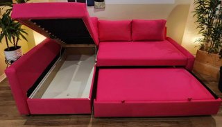 Sofá esquinero rosa de tela