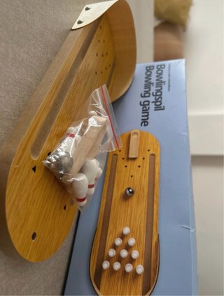 Juego de bolos de madera