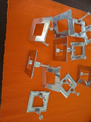 Tiradores cuadrados plateados para muebles